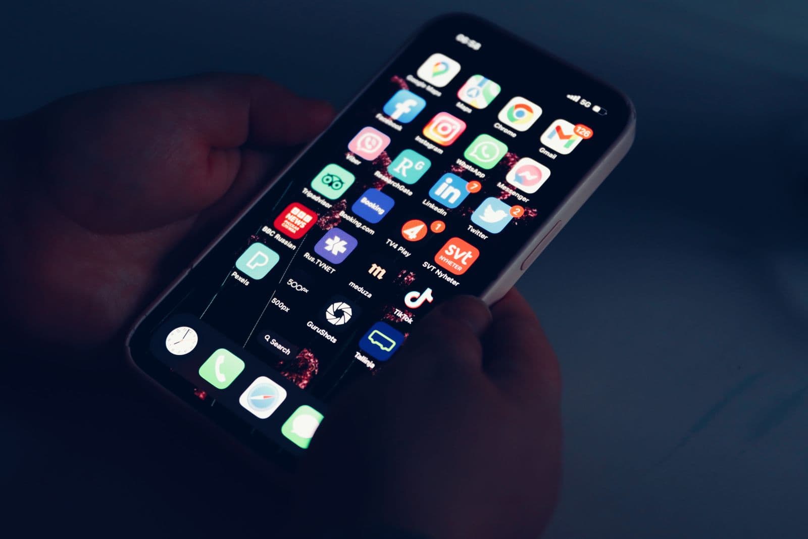 Close-up of a smartphone home screen showing a grid of app icons
